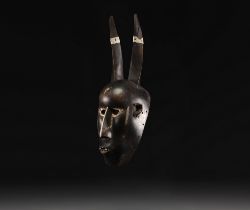Malinke mask in hardwood, with aluminum ornamentation - Mali