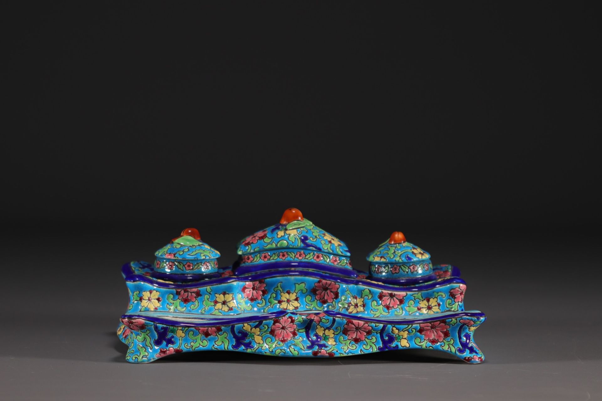 Longwy - Earthenware and enamel writing case decorated with swallows and flowers on an azure blue ba