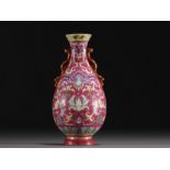 China - Famille rose porcelain wall vase on a ruby background, Qianlong mark.