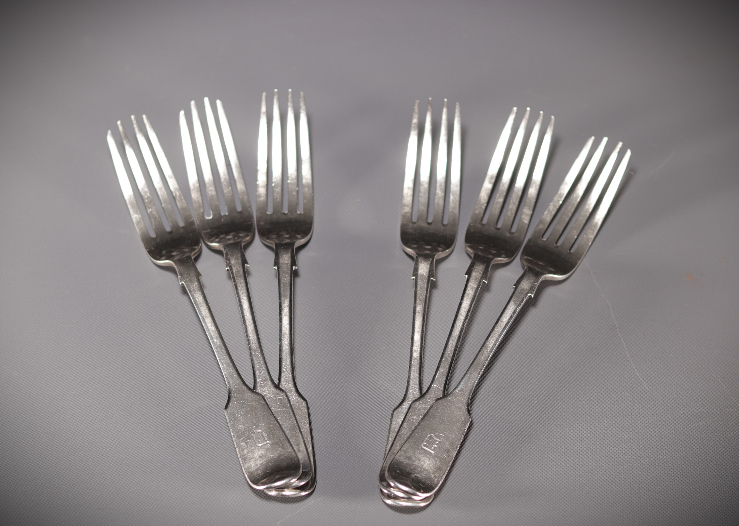 Set of six solid silver forks.