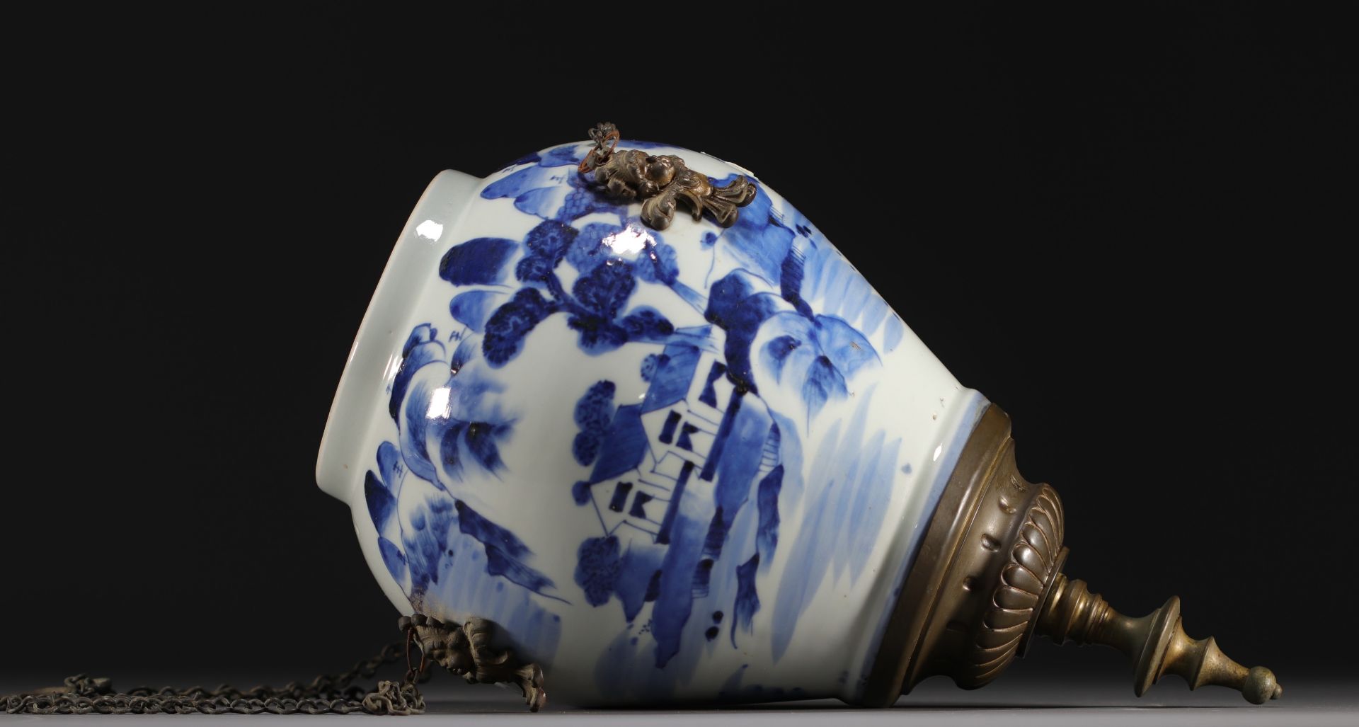 China - Blue and white porcelain vase with landscape design, mounted in a "lantern" shape.