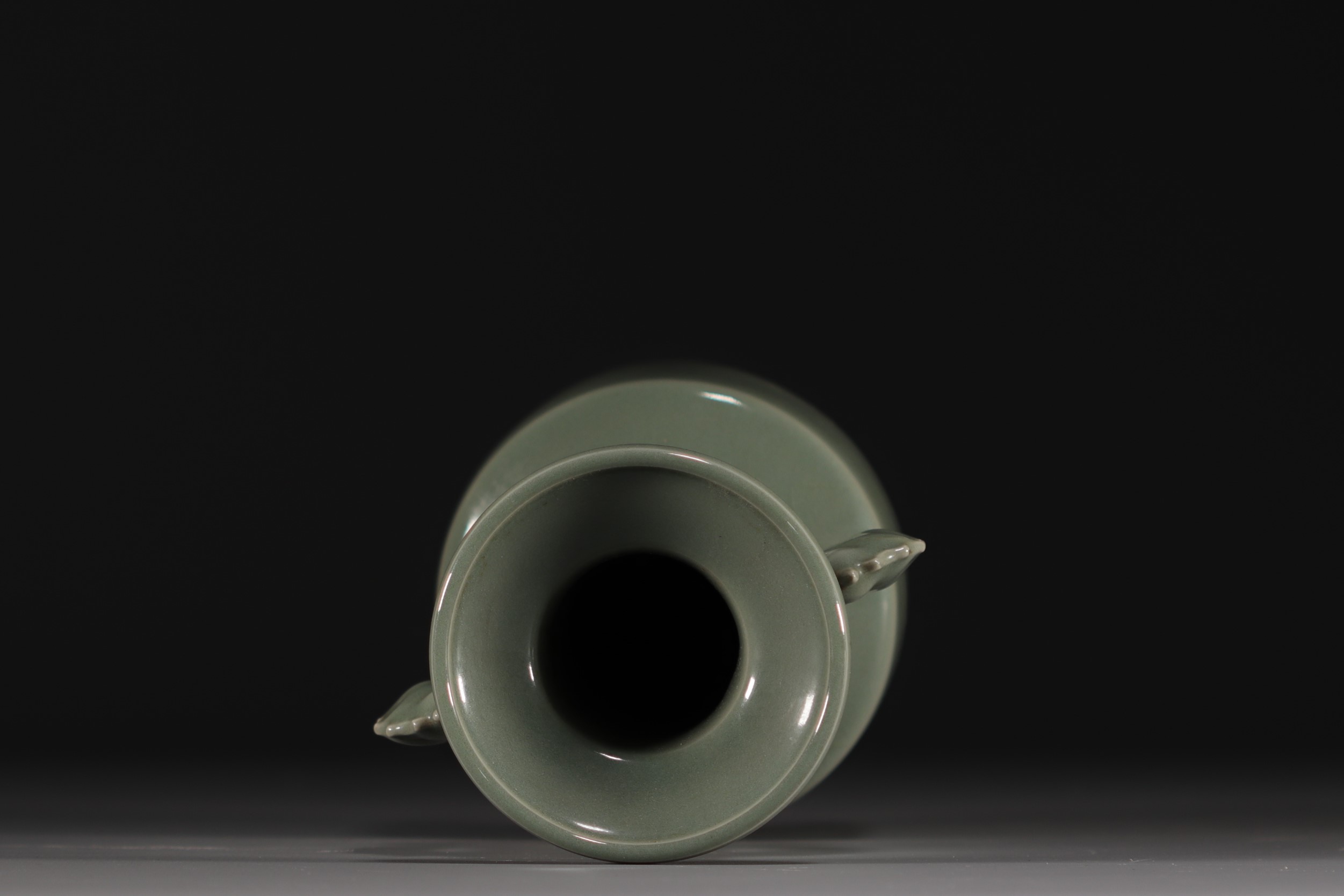 China - A green-glazed monochrome porcelain vase with fish-shaped handles, Qing period. - Image 5 of 5
