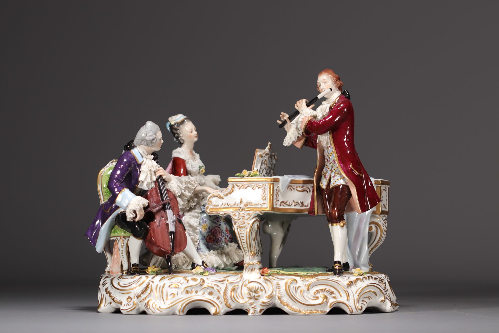 RUDOLSTADT VOLKSTEDT "Concerto" Polychrome porcelain group, mark on base.