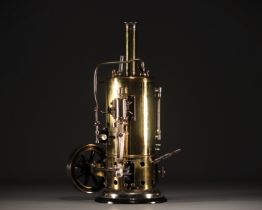 Vertical steam engine with whistle, circa 1900-1920.