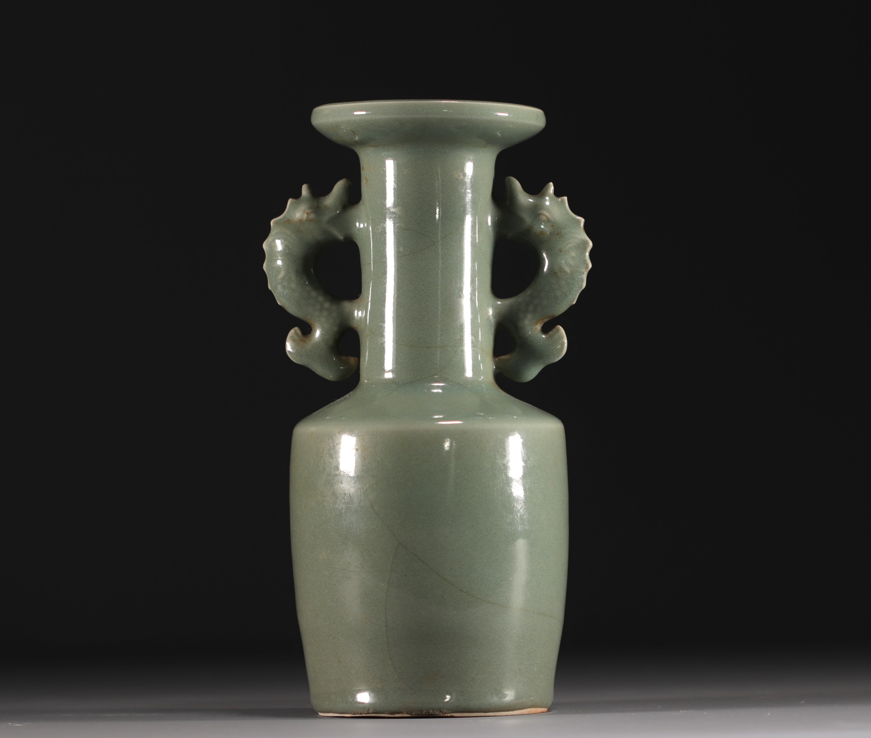 China - A green-glazed monochrome porcelain vase with fish-shaped handles, Qing period. - Image 3 of 5