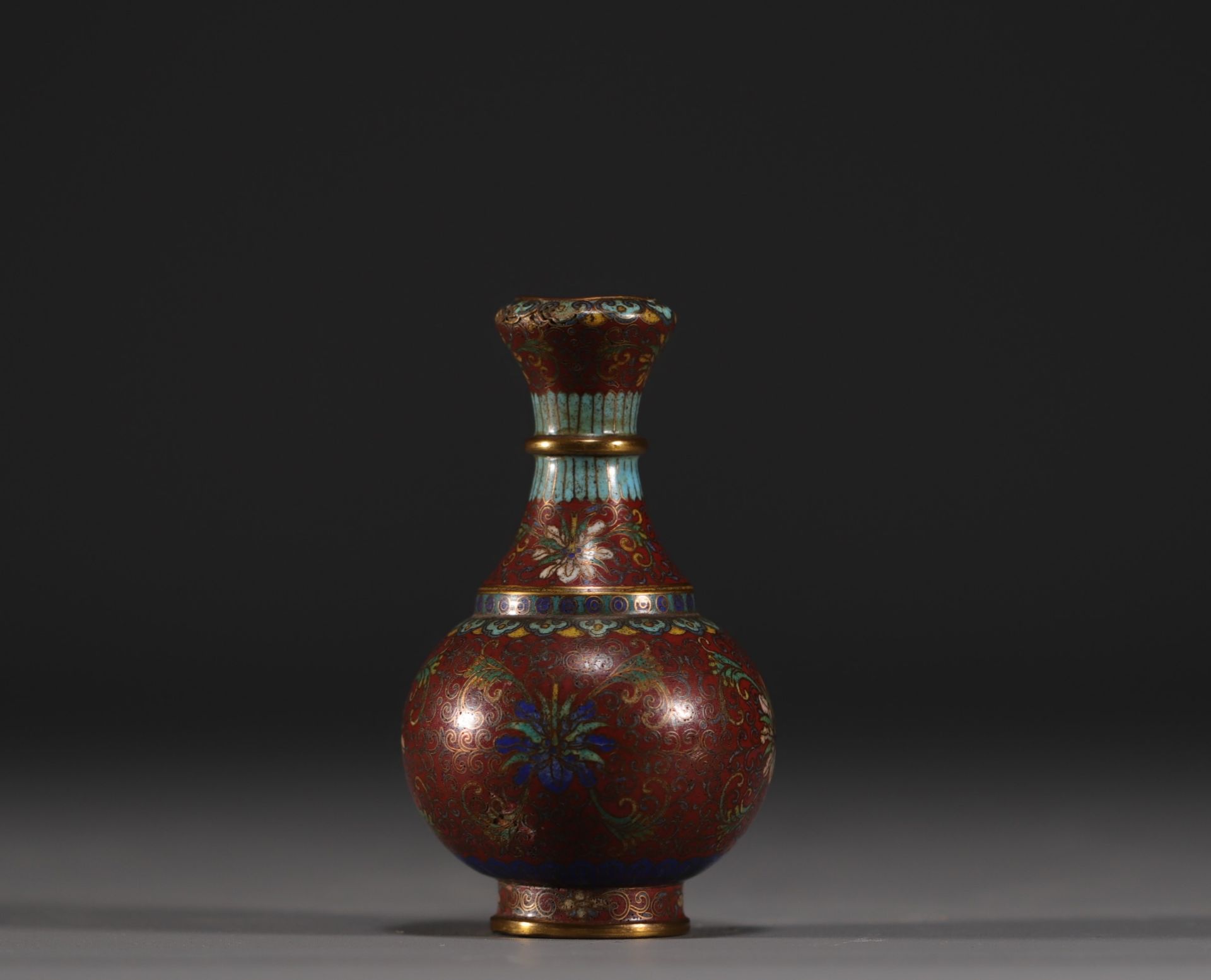 China - Small cloisonne enamel vase, signature under the piece.