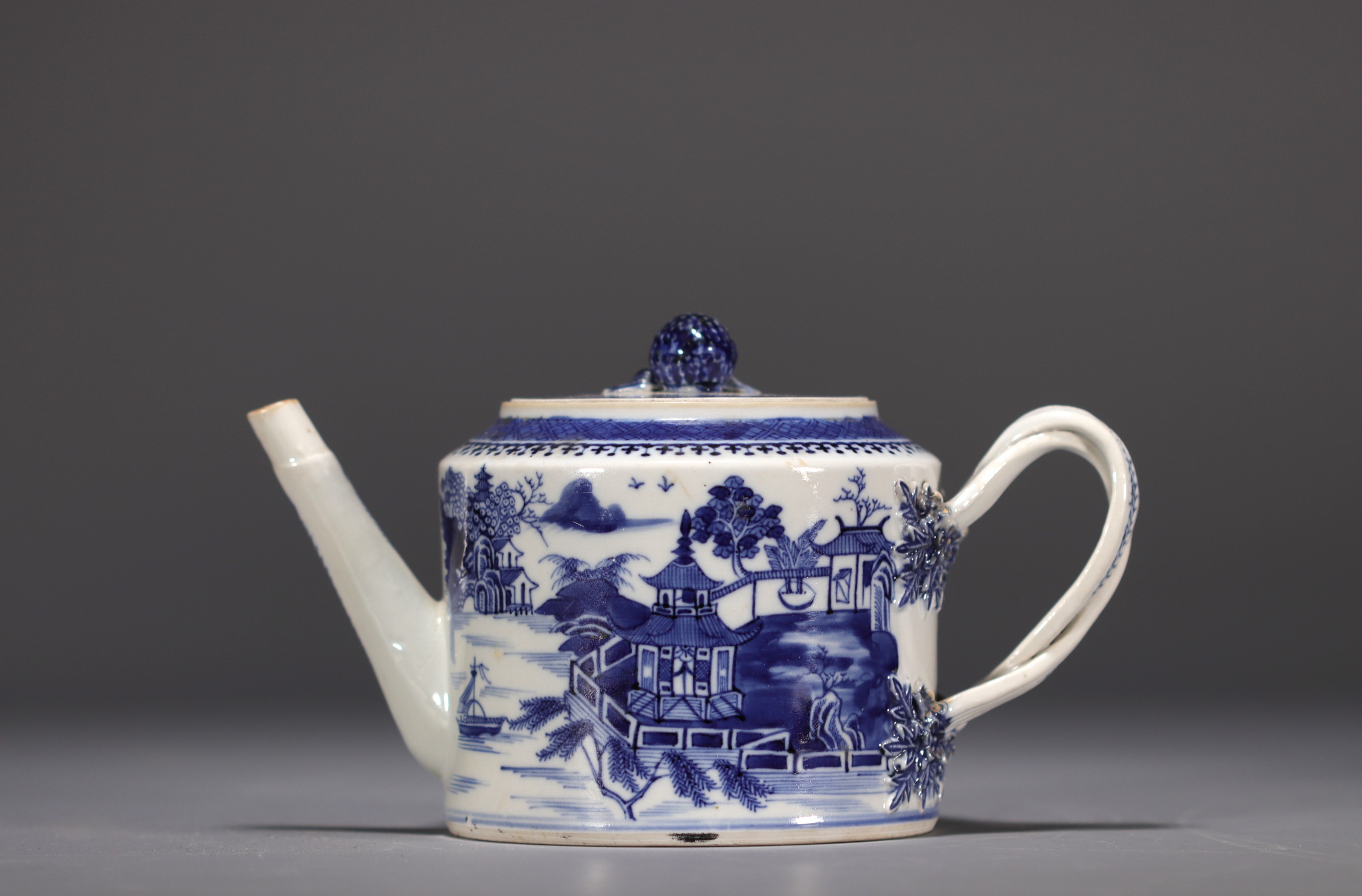 China - A white and blue porcelain teapot decorated with landscapes and a junk, 18th century. - Image 2 of 8