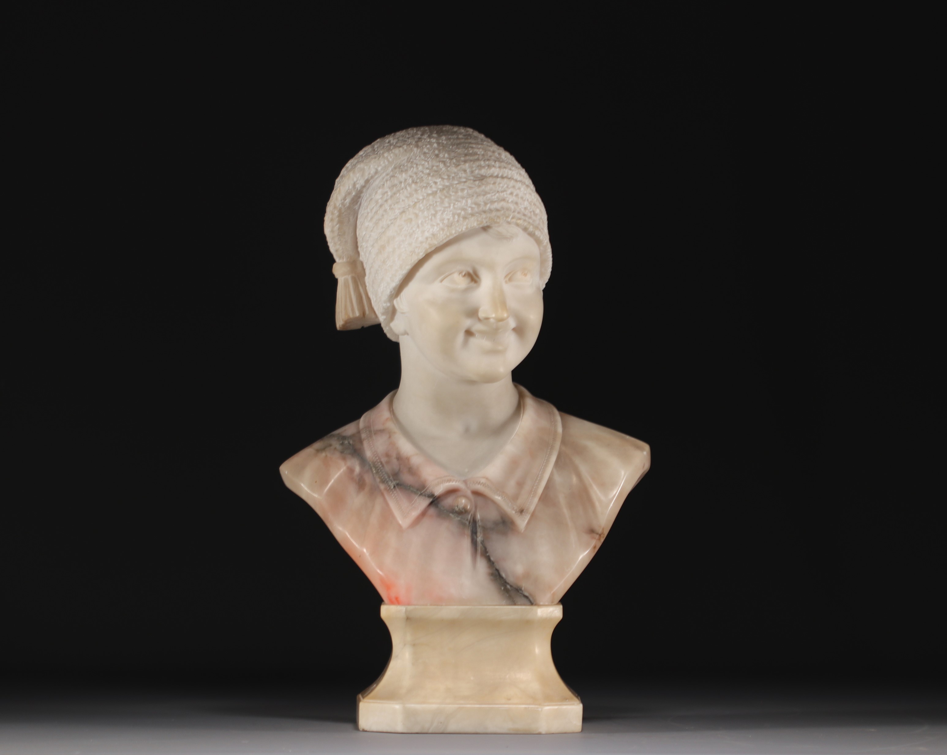 G. PINESCHI - "Young Neapolitan fisherman" Bust in pink alabaster, early 20th century.