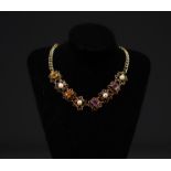 Necklace in 18k yellow gold, amethyst, octagon-cut yellow sapphire and natural pearls.