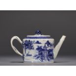 China - A white and blue porcelain teapot decorated with landscapes and a junk, 18th century.