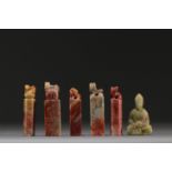 China - Set of five hard stone seals and a carved jade figure.