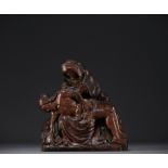 "Virgin Mary in Sorrow" Pieta in carved wood, trace of polychromy, circa 1500.