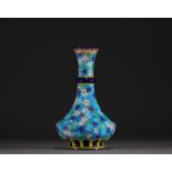 Longwy - Napoleon III earthenware and enamel vase with flowers on an azure blue background, 19th cen