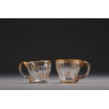 DAUM Nancy - Pair of small glass cups with engraved thistle design enhanced with gold, signed.