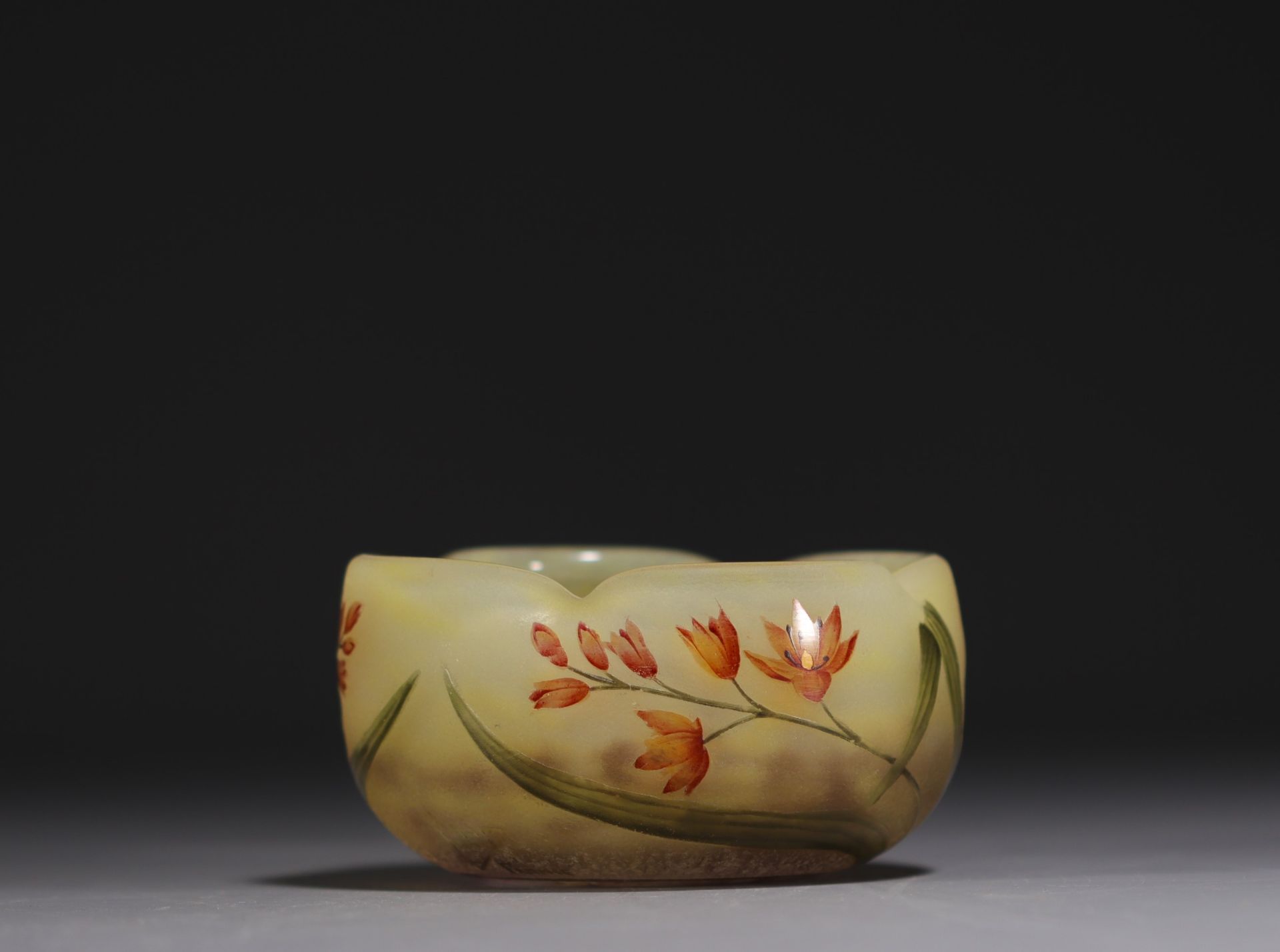 DAUM Nancy - Four-lobed cup in acid-etched glass decorated with enamelled flowers, signed in the dec