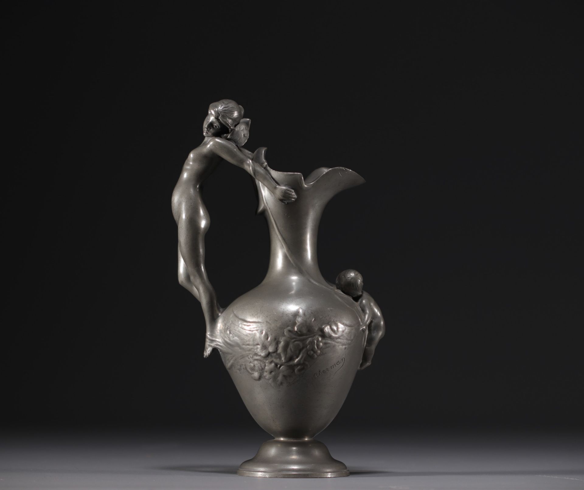 AKERMAN - Pewter jug vase with elf and baby design, circa 1900.
