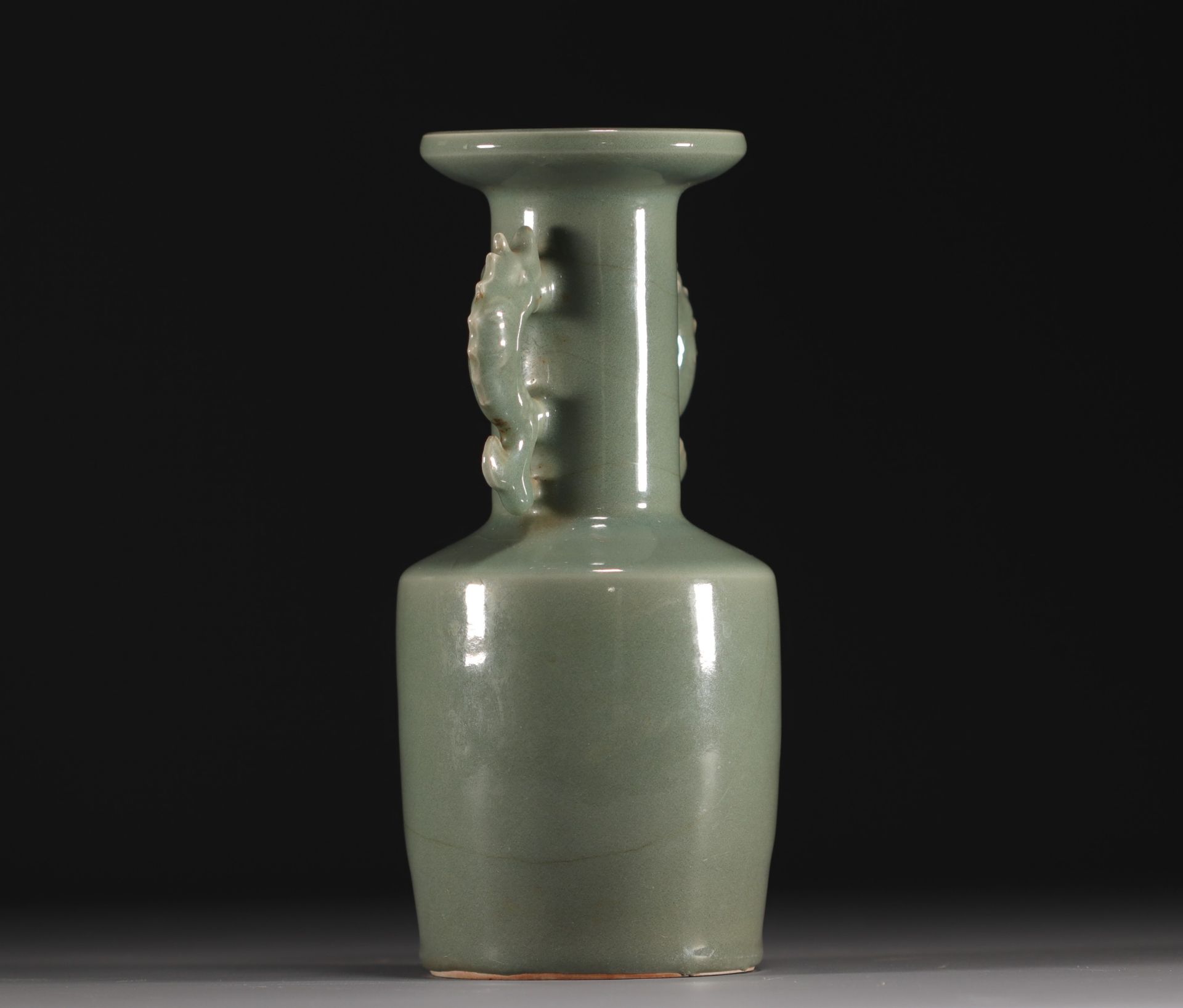 China - A green-glazed monochrome porcelain vase with fish-shaped handles, Qing period. - Image 2 of 5
