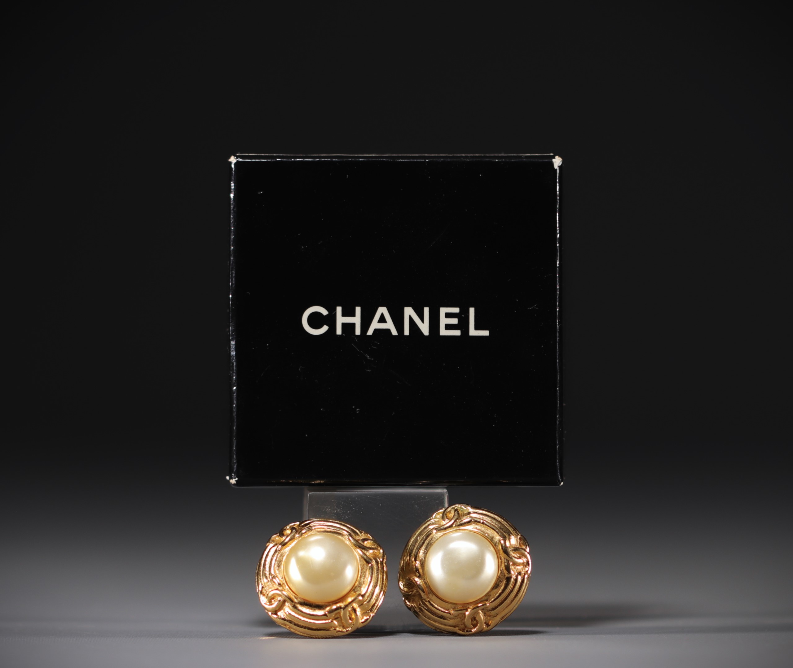 CHANEL - Pair of gold-coloured earrings, mother-of-pearl cabochon.