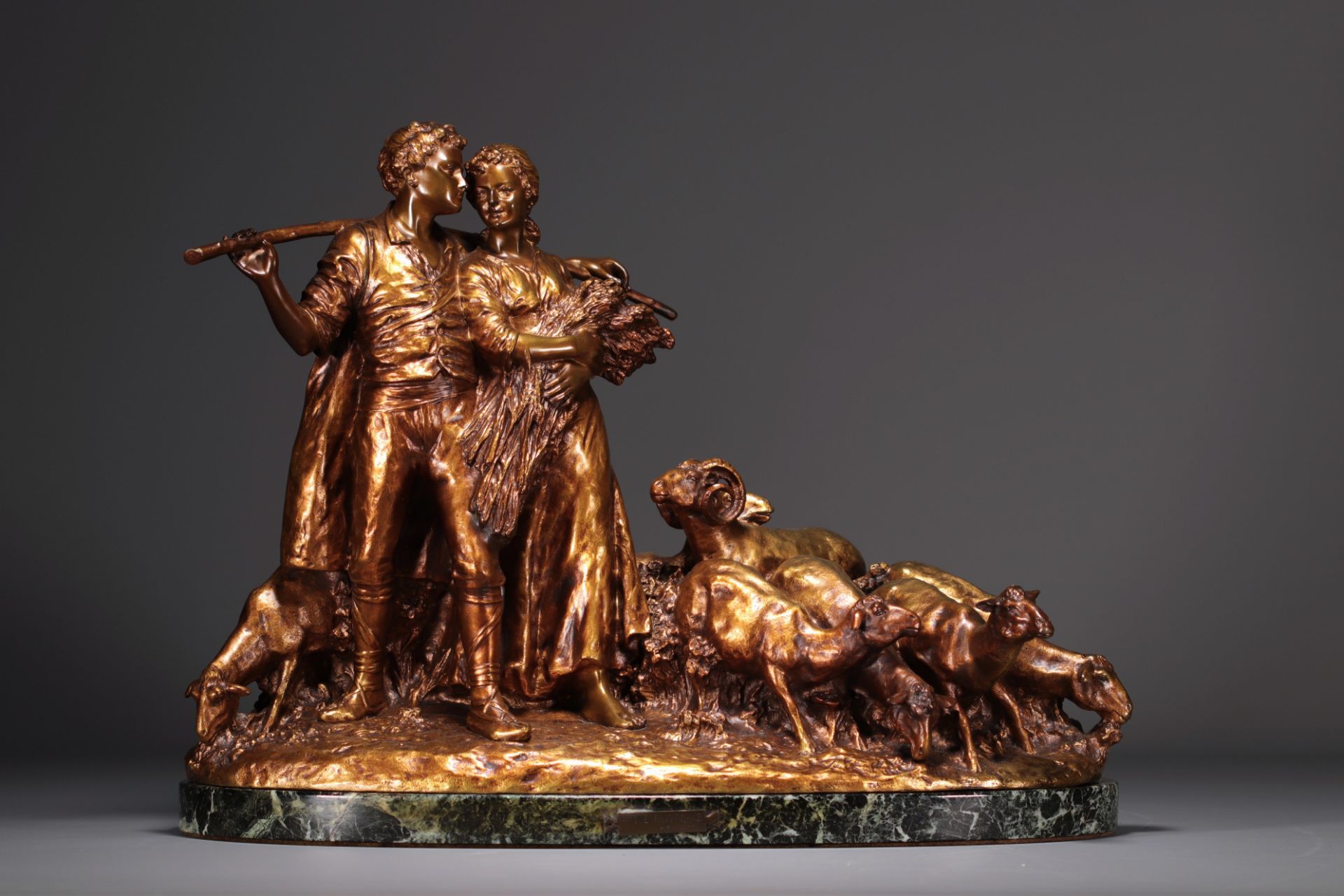 Joseph d'ASTE (1881-1945) "Couple of shepherds and sheep" Bronze with golden patina on marble base.