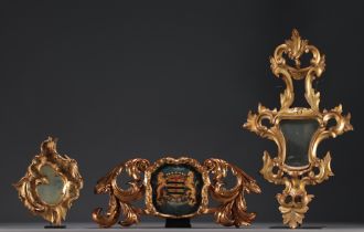 Set of three carved and gilded baroque wood panels, two mirrors and a cartouche with coat of arms an