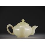 China - White jade teapot.