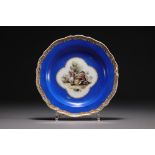 Meissen - Fine porcelain plate decorated with a figure, blue mark with crossed swords.