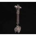 Magnificent large silver chatelaine decorated with various charms, Dutch hallmarks and others.