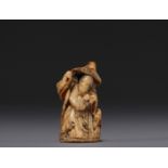 Japan - Netsuke, bone figure, 18th century.