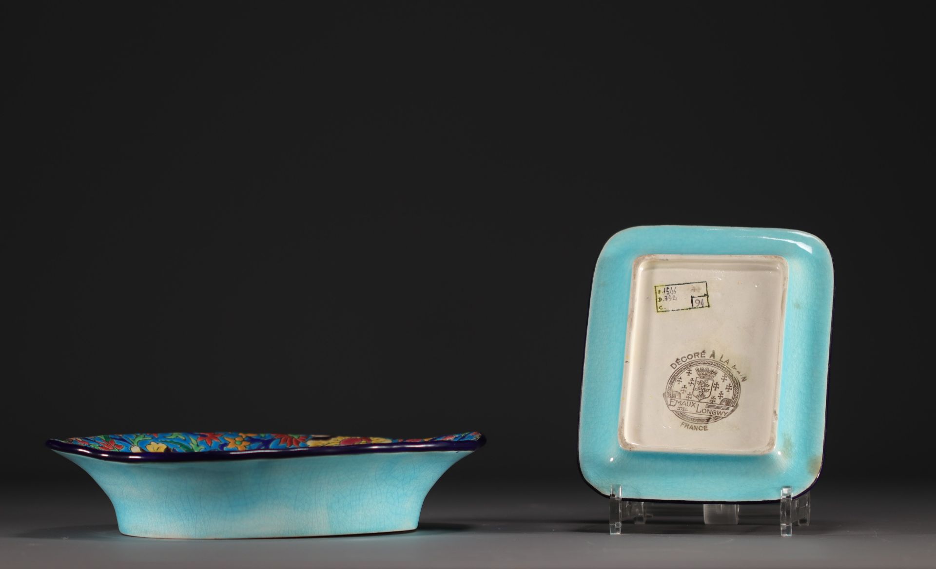 Longwy - Set of two earthenware and enamel dishes decorated with quail and flowers, 20th century. - Image 2 of 3