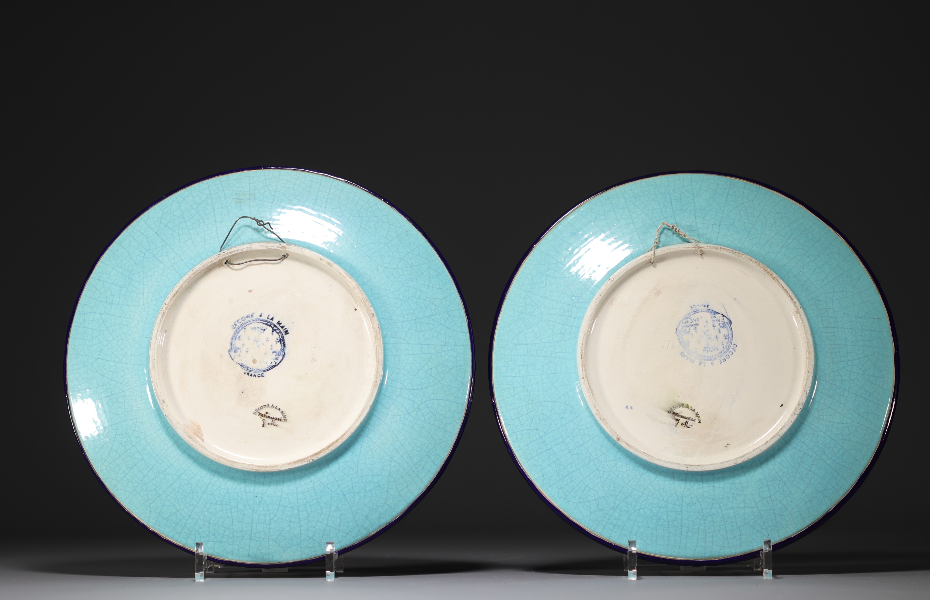Longwy - Pair of large enameled plates decorated with cranes. - Image 2 of 3
