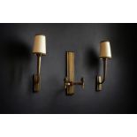 Jean PASCAUD (1903-1996) Set consisting of a double sconce and a pair of single sconces in patinated