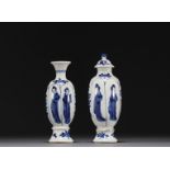 China - Pair of small vases in blue-white porcelain decorated with women, Kangxi period.