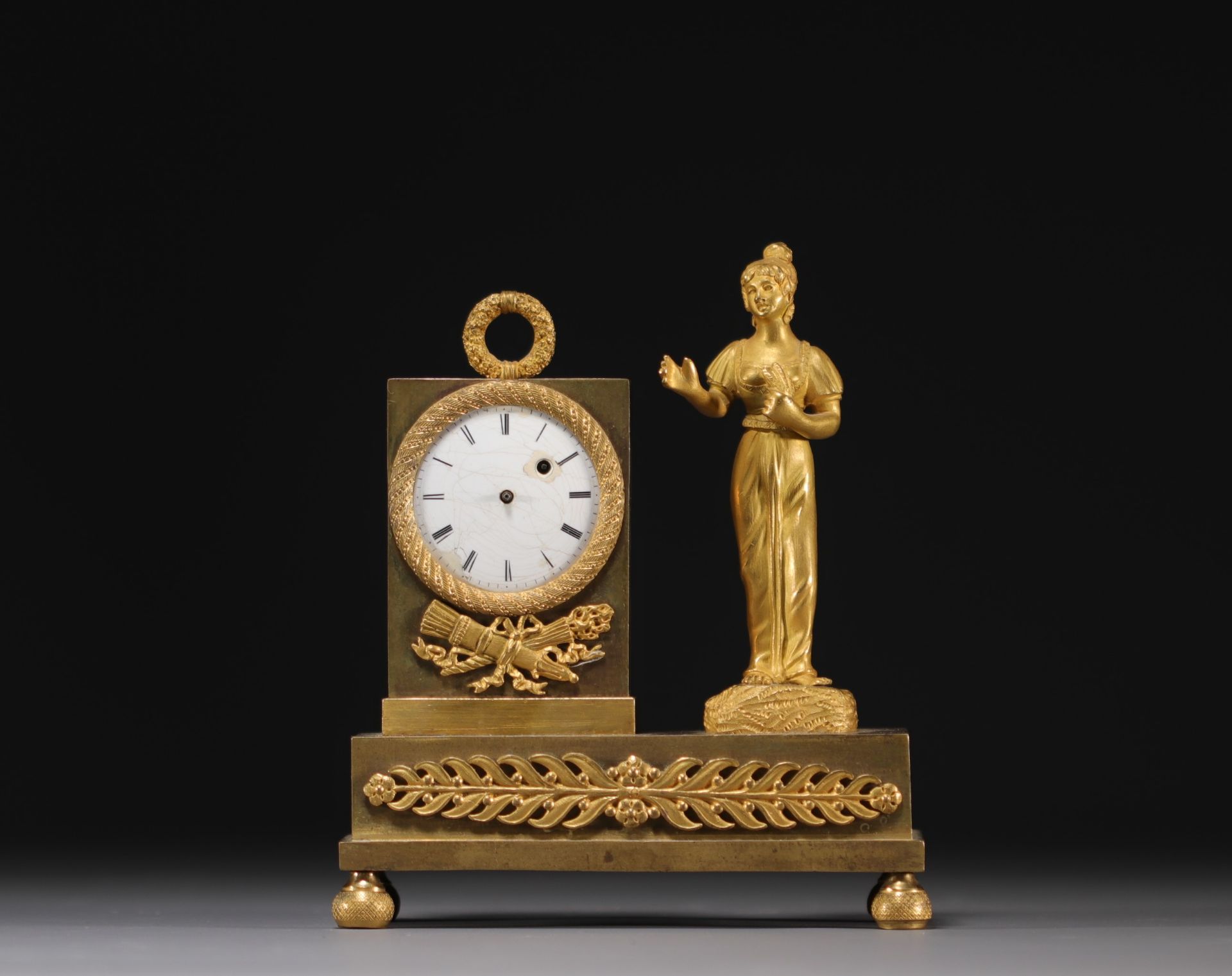 Small Empire period chased and gilt bronze clock with Breguet movement, early 19th century.