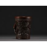 Kuba carved wood palm wine mug, early 20th century.
