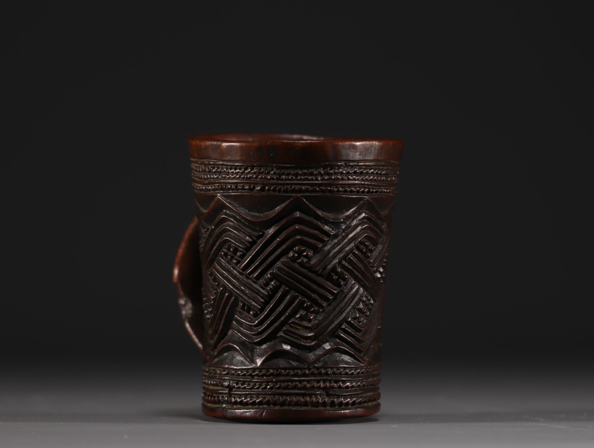 Kuba carved wood palm wine mug, early 20th century.