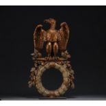 An Empire period carved and gilded Imperial eagle with outstretched wings.