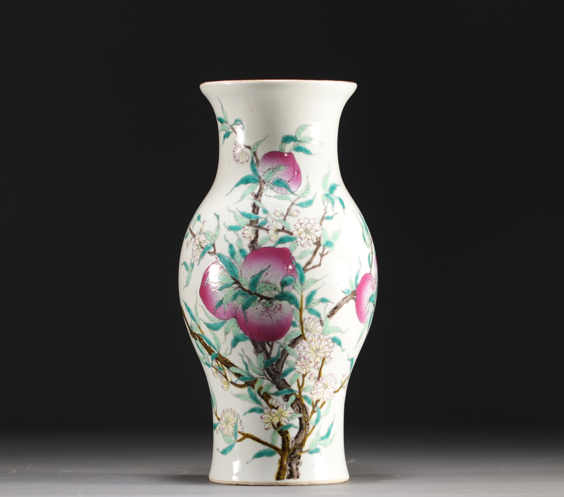 China - Porcelain vase with nine peaches design, famille rose, Qing period.