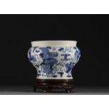 China - A blue-white porcelain vase decorated with lions, Kangxi mark.