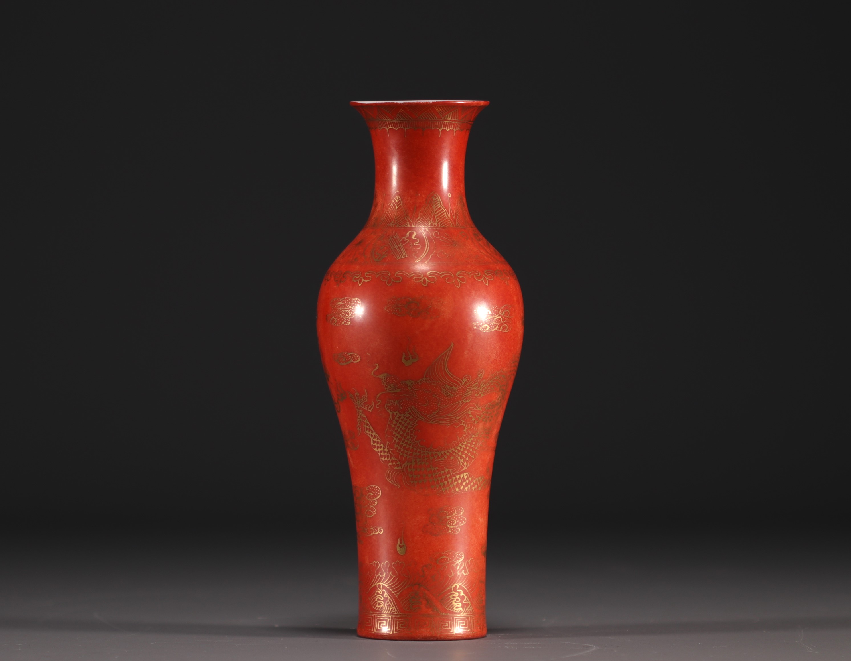 China - Coral-coloured porcelain vase with gold dragon decoration, 19th century.