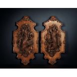 Black Forest - Pair of hunting trophies in low relief depicting furred and feathered game, late 19th