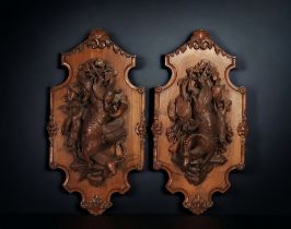 Black Forest - Pair of hunting trophies in low relief depicting furred and feathered game, late 19th