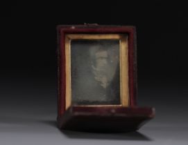 Old small souvenir box containing a mirror with a picture of a gentleman. 19th century.