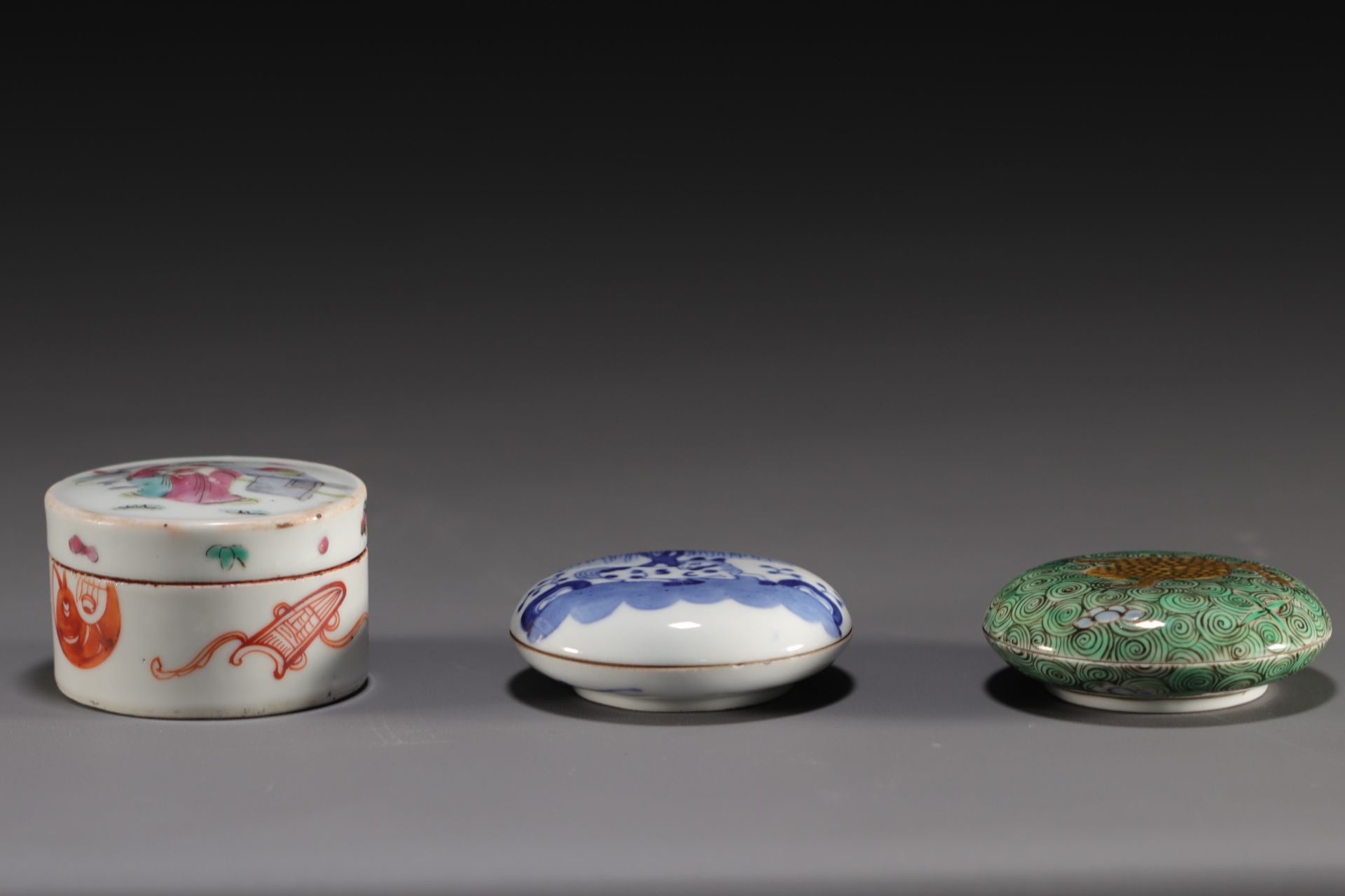 China - Set of three porcelain ink boxes with various decorations.