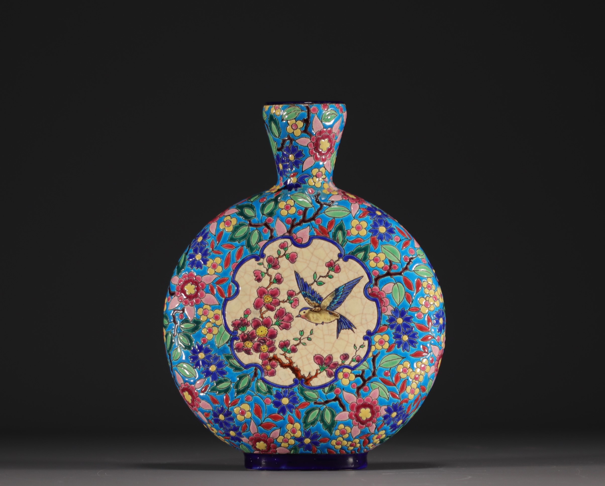 Longwy - Earthenware and enamel gourd vase decorated with a titmouse and flowers on an azure blue ba