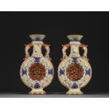 Pair of Wasmuel earthenware openwork "Buire" vases, circa 1900.