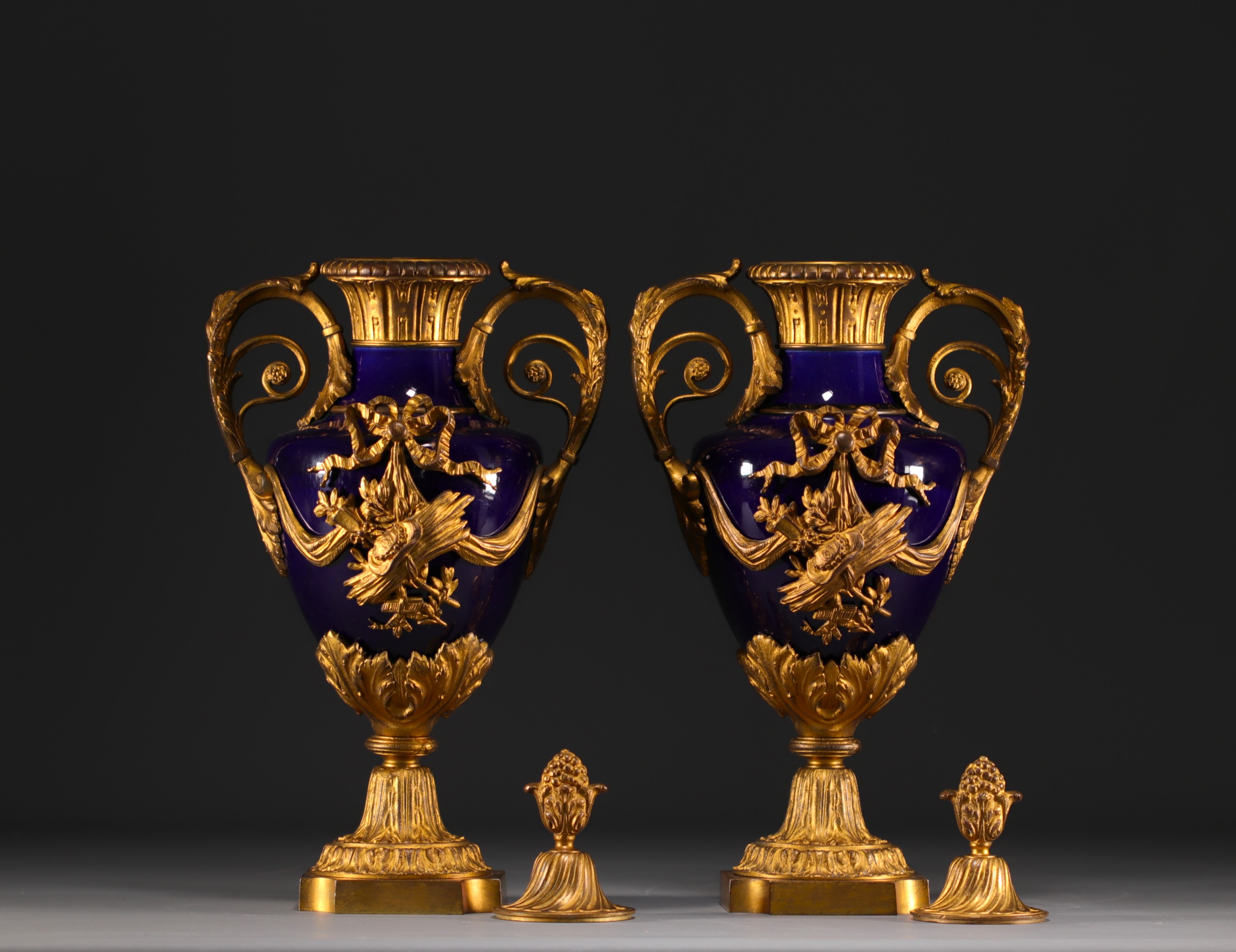 Pair of Louis XVI style covered vases in "bleu de Sevres" porcelain, gilded and chased bronzes. - Image 3 of 3