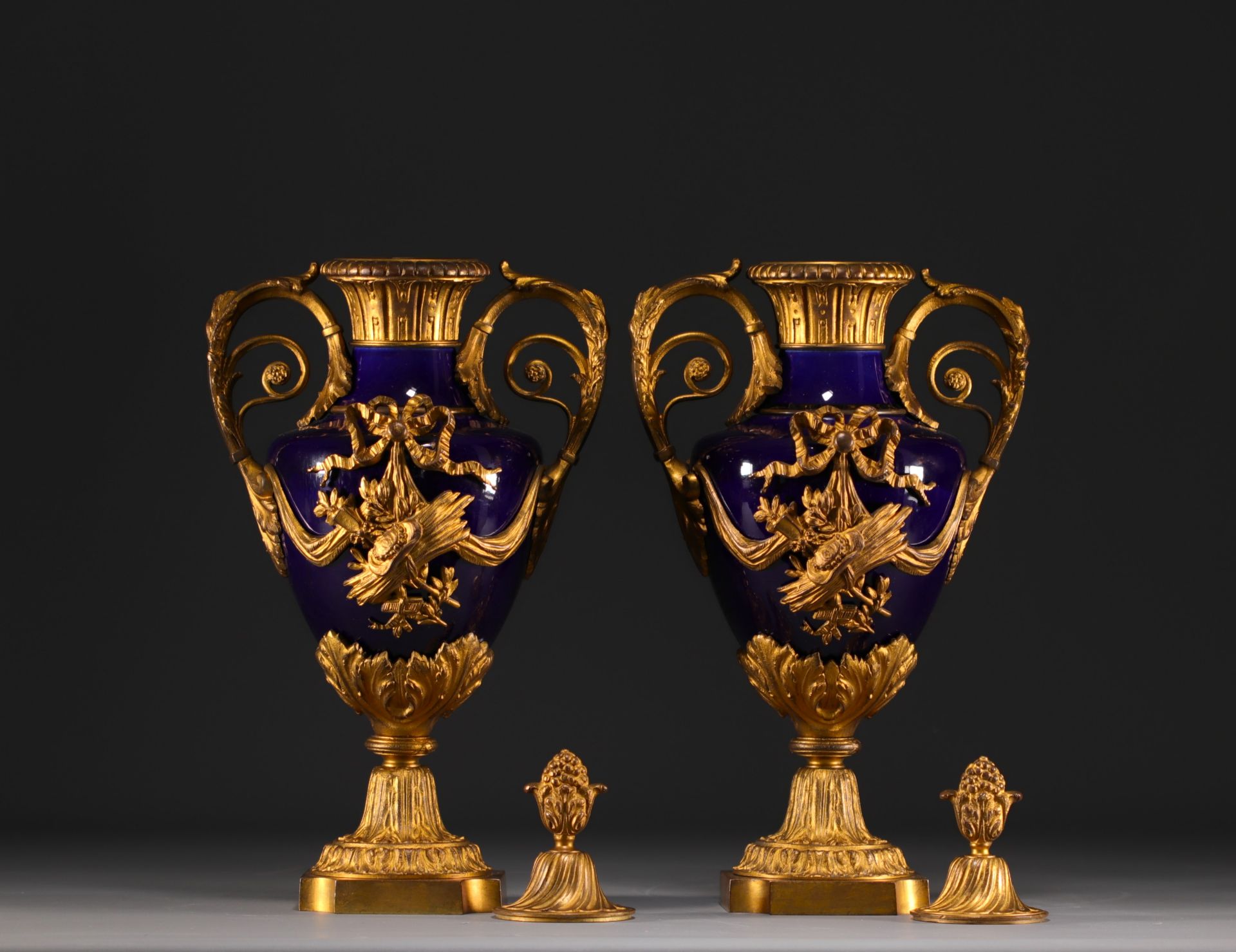 Pair of Louis XVI style covered vases in "bleu de Sevres" porcelain, gilded and chased bronzes. - Image 3 of 3