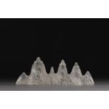 China - Carved rock crystal brush-holder, depicting mountains.