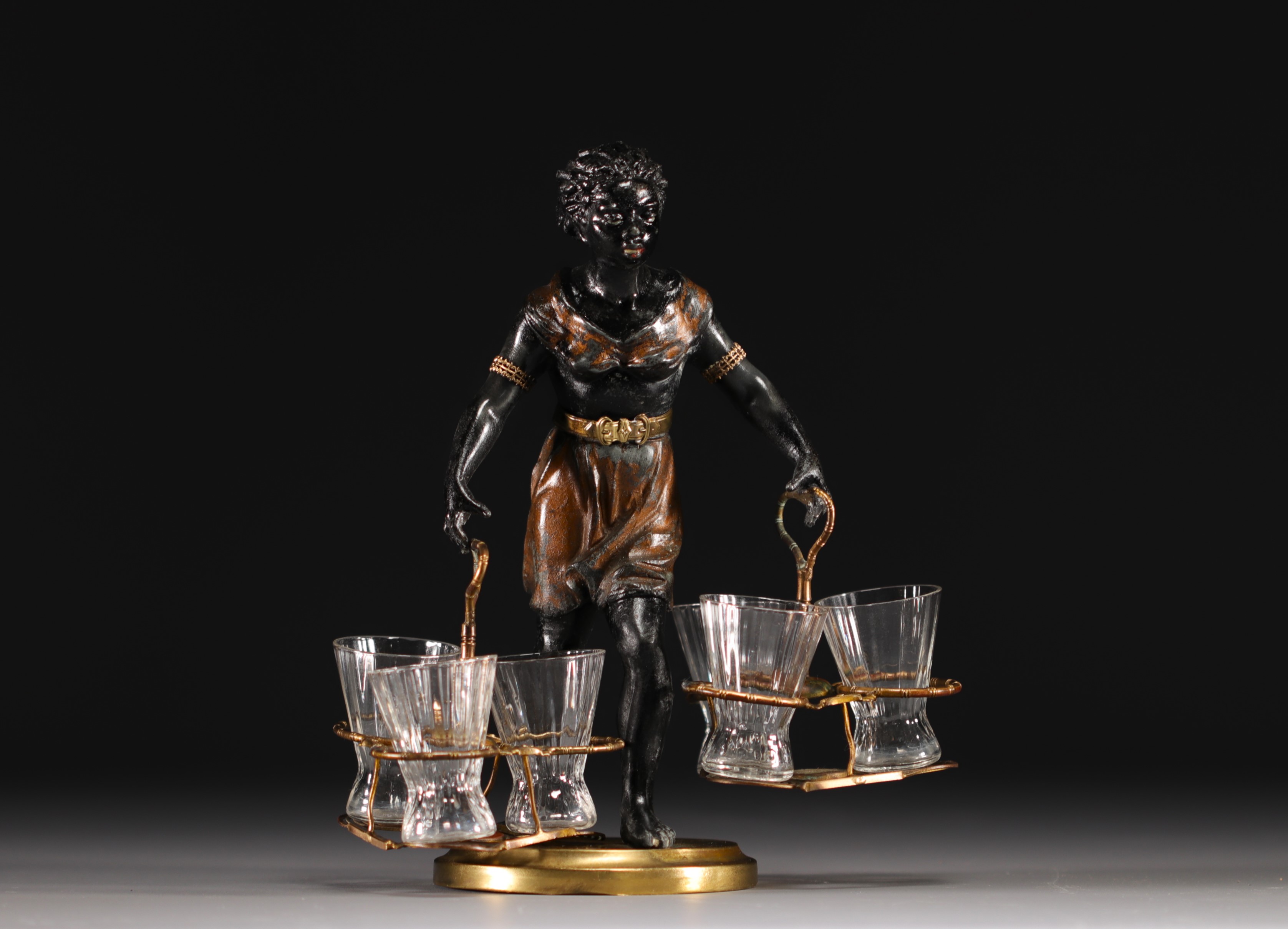 Napoleon III "Au Negre" liqueur service in polychrome regula, late 19th century.