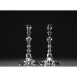 Pair of solid silver candlesticks, hallmarked 835 and three diamond hallmark, 20th century.